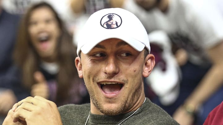 Mar 4, 2017; College Station, TX, USA; Former Texas A&M Aggies quarterback and 2012 Heisman Trophy winner Johnny Manziel watches a game against the Kentucky Wildcats at Reed Arena. Mandatory Credit: Troy Taormina-Imagn Images
