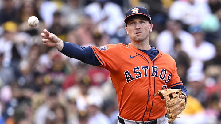 Houston Astros third baseman Alex Bregman throws a ball.