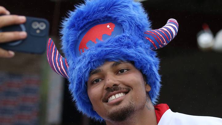 Bills rookie linebacker TJ Parker poses for photos with fans at the end of day two of Buffalo Bills training camp. Bills rookie linebacker TJ Parker poses for photos with fans at the end of day two of Buffalo Bills training camp.