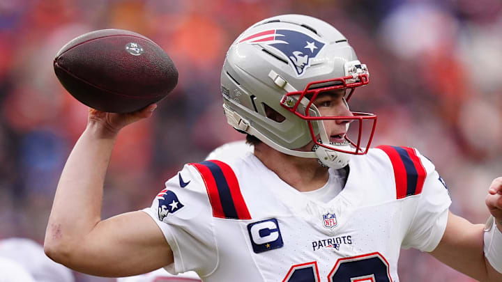 Jan 25, 2026; Denver, CO, USA; New England Patriots quarterback Drake Maye (10) drops back to pass against the Denver Broncos during the first half in the 2026 AFC Championship Game at Empower Field at Mile High. Mandatory Credit: Ron Chenoy-Imagn Images