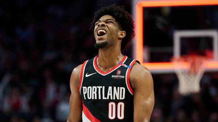 Feb 22, 2025; Portland, Oregon, USA; Portland Trail Blazers guard Scoot Henderson (00) reacts after missing a three point basket during the second half against the Charlotte Hornets at Moda Center. Mandatory Credit: Troy Wayrynen-Imagn Images