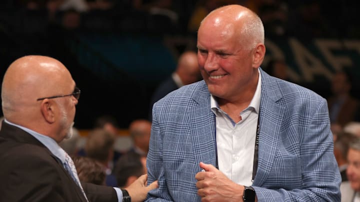 Blues GM Doug Armstrong speaking with GM of the Nashville Predators, Barry Trotz