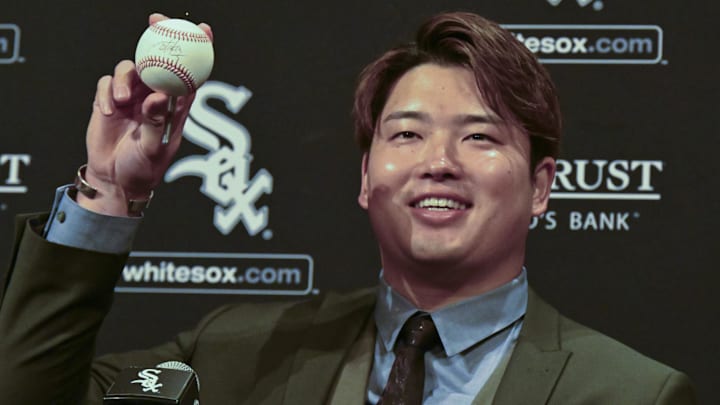 New Chicago White Sox infielder Munetaka Murakami holds a signed baseball during his introductory press conference at Rate Field. New Chicago White Sox infielder Munetaka Murakami holds a signed baseball during his introductory press conference at Rate Field.