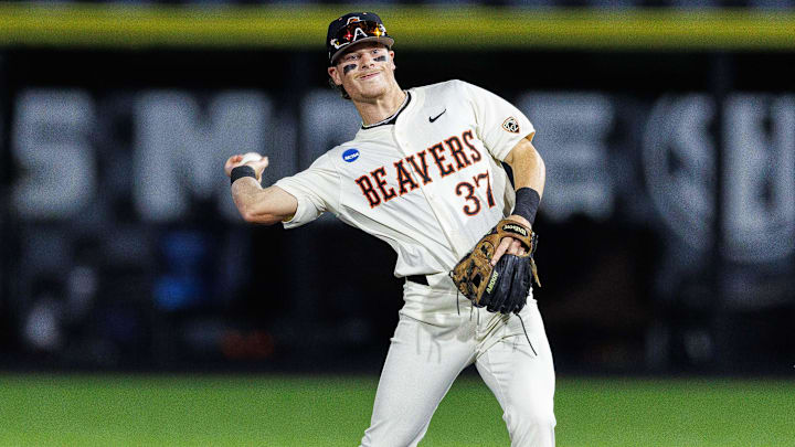 Jun 9, 2024; Lexington, KY, USA; Oregon State Beavers infielder Travis Bazzana (37) throws the ball during the second inning against the Kentucky Wildcats at Kentucky Proud Park. Mandatory Credit: Jordan Prather-Imagn Images