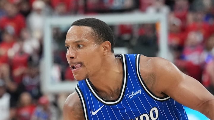 Orlando Magic guard Desmond Bane dribbles the ball against LA Clippers guard Bennedict Mathurin.