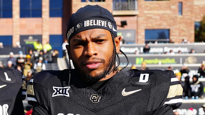 Nov 29, 2024; Boulder, Colorado, USA; Colorado Buffaloes quarterback Shedeur Sanders (2) and safety Shilo Sanders (21) before the game against the Oklahoma State Cowboys at Folsom Field. Mandatory Credit: Ron Chenoy-Imagn Images