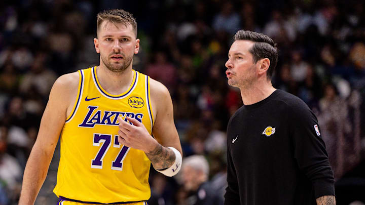 Jan 6, 2026; New Orleans, Louisiana, USA; Los Angeles Lakers forward/guard Luka Doncic (77) talks to Head Coach JJ Redick against the New Orleans Pelicans during the second half at Smoothie King Center. Mandatory Credit: Stephen Lew-Imagn Images Jan 6, 2026; New Orleans, Louisiana, USA; Los Angeles Lakers forward/guard Luka Doncic (77) talks to Head Coach JJ Redick against the New Orleans Pelicans during the second half at Smoothie King Center. Mandatory Credit: Stephen Lew-Imagn Images