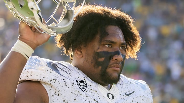 Nov 18, 2023; Tempe, Arizona, USA; Oregon Ducks offensive lineman Iapani Laloulu (72) against the Arizona State Sun Devils at Mountain America Stadium. Mandatory Credit: Mark J. Rebilas-Imagn Images