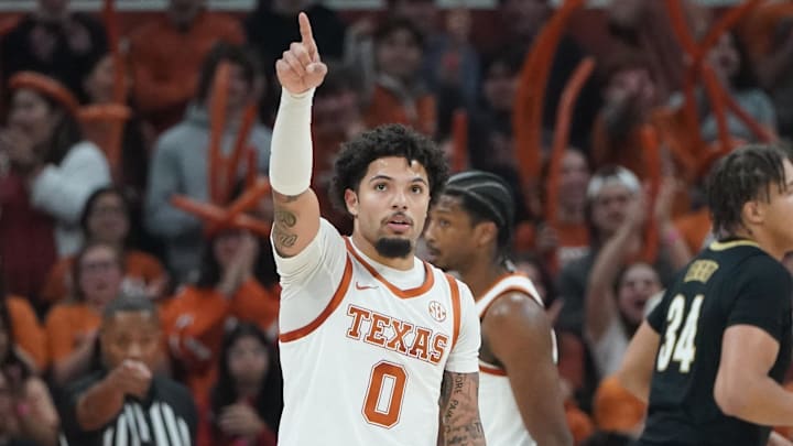 Texas Longhorns guard Jordan Pope celebrates possession of the ball against the Vanderbilt Commodores during the first half at Moody Center. 