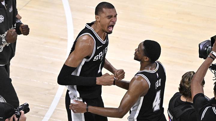 May 30, 2026; Oklahoma City, Oklahoma, USA; San Antonio Spurs forward Victor Wembanyama (1) celebrates with guard De'aaron Fox (4) after defeating the Oklahoma City Thunder in game seven of the western conference finals for the 2026 NBA playoffs at Paycom Center. Mandatory Credit: Jerome Miron-Imagn Images