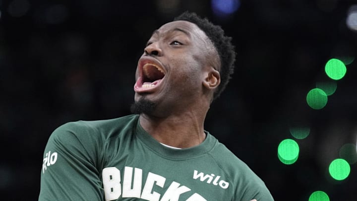 Milwaukee Bucks forward Thanasis Antetokounmpo reacts after Milwaukee Bucks guard AJ Green made a three point shot against the Detroit Pistons at Fiserv Forum on December 3.