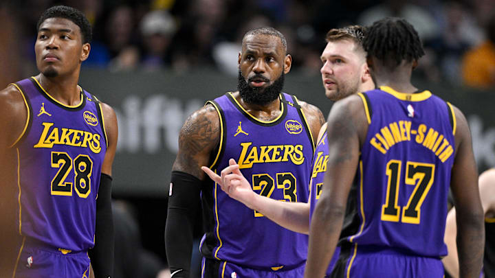 Apr 9, 2025; Dallas, Texas, USA; Los Angeles Lakers forward Rui Hachimura (28) and forward LeBron James (23) and guard Luka Doncic (77) and forward Dorian Finney-Smith (17) during the game between the Dallas Mavericks and the Los Angeles Lakers at American Airlines Center. Mandatory Credit: Jerome Miron-Imagn Images