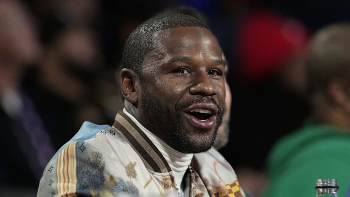 Dec 14, 2024; Las Vegas, Nevada, USA; Floyd Mayweather looks on during the first half between the Milwaukee Bucks and the Atlanta Hawks in a semifinal of the 2024 Emirates NBA Cup at T-Mobile Arena. Mandatory Credit: Kyle Terada-Imagn Images