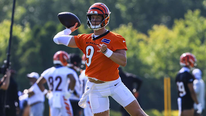 Jul 23, 2025; Cincinnati, OH, USA; Cincinnati Bengals quarterback Joe Burrow (9) throws a pass during training camp at Kettering Health Practice Field. Mandatory Credit: Katie Stratman-Imagn Images