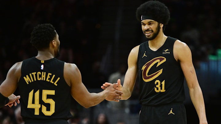 Apr 10, 2024; Cleveland, Ohio, USA; Cleveland Cavaliers guard Donovan Mitchell (45) and center Jarrett Allen (31) celebrate during the second half against the Memphis Grizzlies at Rocket Mortgage FieldHouse. Mandatory Credit: Ken Blaze-Imagn Images