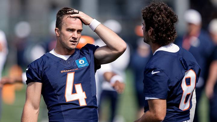 Jul 23, 2025; Englewood, CO, USA; Denver Broncos quarterback Sam Ehlinger (4) and quarterback Jarrett Stidham (8) during Denver Broncos Training Camp. 