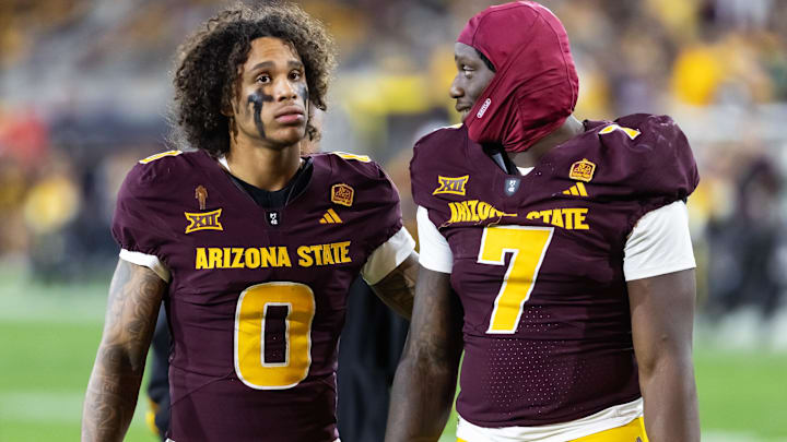 Nov 28, 2025; Tempe, Arizona, USA; Arizona State Sun Devils wide receiver Jordyn Tyson (0) with tight end Chamon Metayer (7) against the Arizona Wildcats during the 99th Territorial Cup at Mountain America Stadium. Mandatory Credit: Mark J. Rebilas-Imagn Images Nov 28, 2025; Tempe, Arizona, USA; Arizona State Sun Devils wide receiver Jordyn Tyson (0) with tight end Chamon Metayer (7) against the Arizona Wildcats during the 99th Territorial Cup at Mountain America Stadium. Mandatory Credit: Mark J. Rebilas-Imagn Images