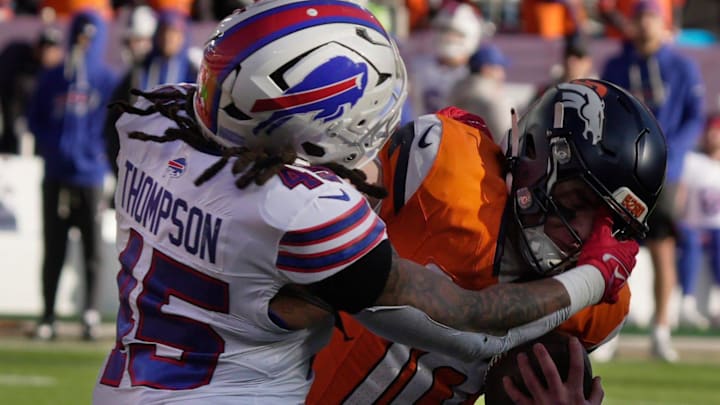 Buffalo Bills linebacker Shaq Thompson sacks Denver Broncos quarterback Bo Nix who kept the ball and was going to run with it during first half action at Empower FIeld at Mile High in Denver, Colorado on Jan. 17, 2026.