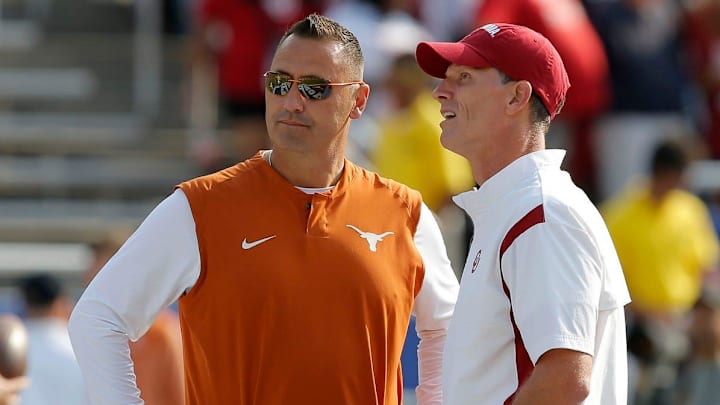 Oklahoma coach Brent Venables (right) and Texas coach Steve Sarkisian. Oklahoma coach Brent Venables (right) and Texas coach Steve Sarkisian.