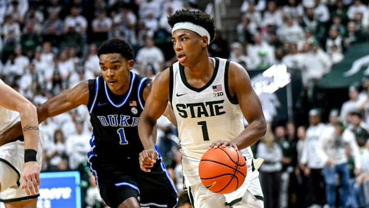 Michigan State's Jeremy Fears Jr., right, moves the ball as Duke's Caleb Foster defends during the second half on Saturday, Dec. 6, 2025, at the Breslin Center in East Lansing. Michigan State's Jeremy Fears Jr., right, moves the ball as Duke's Caleb Foster defends during the second half on Saturday, Dec. 6, 2025, at the Breslin Center in East Lansing.