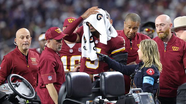 Jayden Daniels was carted off the field with an arm injury. Jayden Daniels was carted off the field with an arm injury.