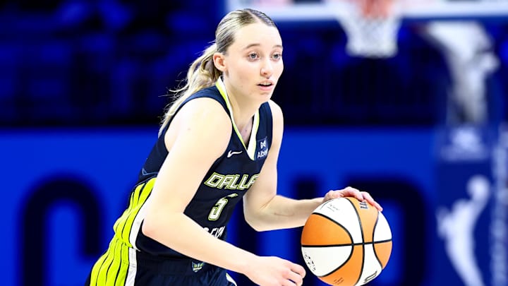 Jul 30, 2025; Arlington, Texas, USA;  Dallas Wings guard Paige Bueckers (5) dribbles against the Atlanta Dream during the second half at College Park Center. Mandatory Credit: Kevin Jairaj-Imagn Images