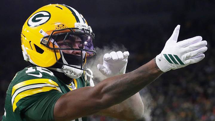 Green Bay Packers receiver/cornerback Bo Melton (16) celebrates a touchdown catch against the Bears. Green Bay Packers receiver/cornerback Bo Melton (16) celebrates a touchdown catch against the Bears.