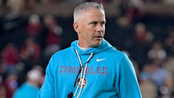 Nov 1, 2025; Tallahassee, Florida, USA; Florida State Seminoles head coach Mike Norvell walks on the field before the game against the Wake Forest Demon Deacons at Doak S. Campbell Stadium. Mandatory Credit: Melina Myers-Imagn Images