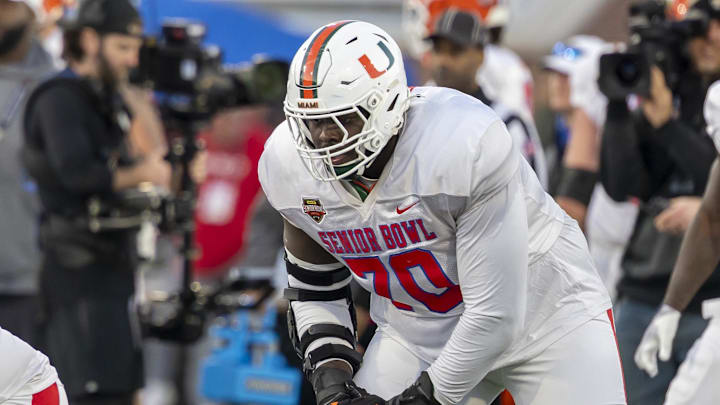 Jan 28, 2026; Mobile, AL, USA; American Team offensive lineman Markel Bell (70) of Miami lines up during American Senior Bowl practice at Hancock Whitney Stadium. Mandatory Credit: Vasha Hunt-Imagn Images