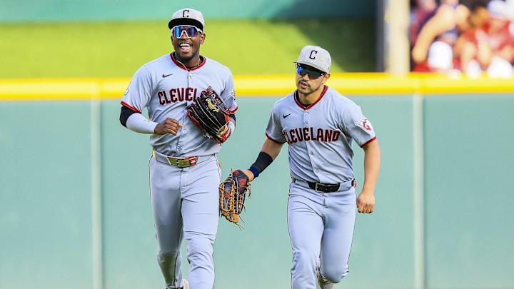 May 17, 2025; Cincinnati, Ohio, USA; Cleveland Guardians outfielder Angel Martinez (1) reacts after a play with outfielder Steven Kwan (38) in the second inning against the Cincinnati Reds at Great American Ball Park. Mandatory Credit: Katie Stratman-Imagn Images