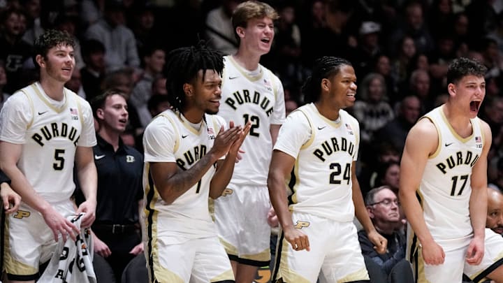 Purdue Boilermakers yell in excitement from the sidelines