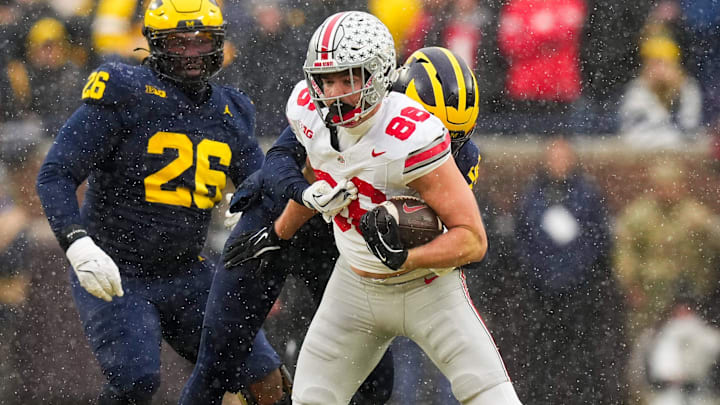 Ohio State Buckeyes tight end Max Klare (86) runs the ball against the Michigan Wolverines in the second half of the NCAA football game at Michigan Stadium on Saturday, Nov. 29, 2025 in Ann Arbor, Michigan.
