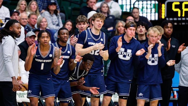 Jan 23, 2026; Fort Collins, Colorado, USA; Utah State Aggies players react from the bench in the second half against the Colorado State Rams at Moby Arena. 