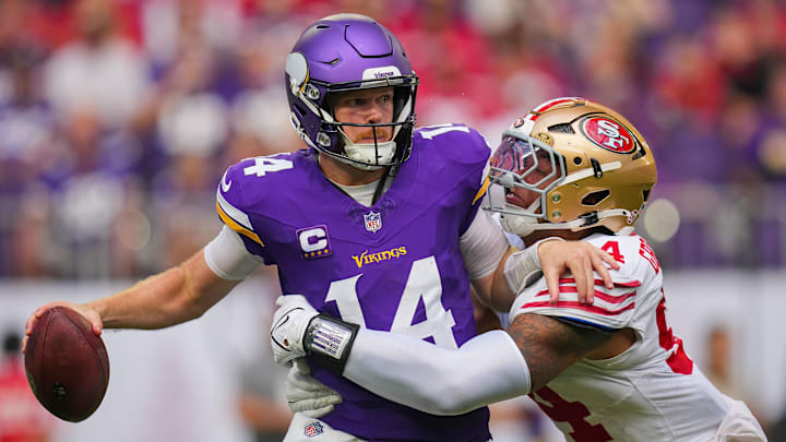 Sep 15, 2024; Minneapolis, Minnesota, USA; San Francisco 49ers defensive end Yetur Gross-Matos (94) tackles Minnesota Vikings quarterback Sam Darnold (14) in the third quarter at U.S. Bank Stadium. Mandatory Credit: Brad Rempel-Imagn Images Sep 15, 2024; Minneapolis, Minnesota, USA; San Francisco 49ers defensive end Yetur Gross-Matos (94) tackles Minnesota Vikings quarterback Sam Darnold (14) in the third quarter at U.S. Bank Stadium. Mandatory Credit: Brad Rempel-Imagn Images