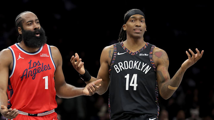 Jan 9, 2026; Brooklyn, New York, USA; Los Angeles Clippers guard James Harden (1) and Brooklyn Nets guard Terance Mann (14) react during the first quarter at Barclays Center. Mandatory Credit: Brad Penner-Imagn Images