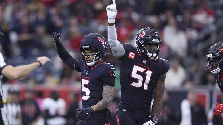 Dec 14, 2025; Houston, Texas, USA; Houston Texans safety Jalen Pitre (5) and defensive end Will Anderson Jr. (51) react after a defensive play during the first half against the Arizona Cardinals at NRG Stadium. Mandatory Credit: Troy Taormina-Imagn Images