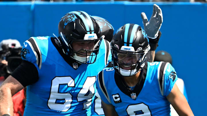 Carolina Panthers quarterback Bryce Young and center Cade Mays 