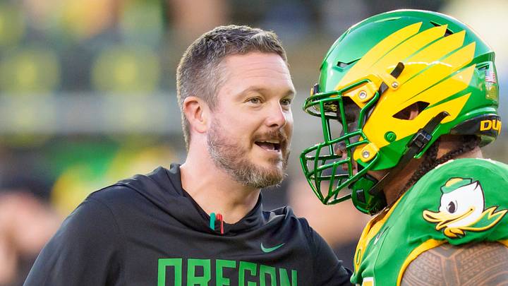 Oregon head coach Dan Lanning, left, talks to Oregon offensive lineman Dave Iuli as the Oregon Ducks host the Portland State Vikings on Sept. 18, 2026, at Autzen Stadium in Eugene, Oregon Oregon head coach Dan Lanning, left, talks to Oregon offensive lineman Dave Iuli as the Oregon Ducks host the Portland State Vikings on Sept. 18, 2026, at Autzen Stadium in Eugene, Oregon