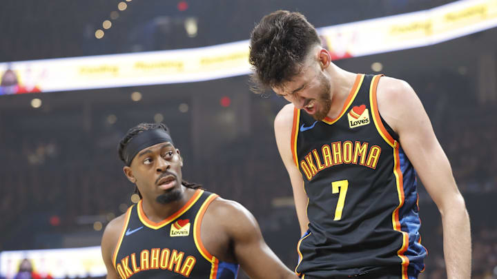 May 5, 2025; Oklahoma City, Oklahoma, USA; Oklahoma City Thunder guard Luguentz Dort (5) checks on forward Chet Holmgren (7) after he was hit during a play against the Denver Nuggets during the first quarter during game one of the second round for the 2025 NBA Playoffs at Paycom Center. Mandatory Credit: Alonzo Adams-Imagn Images May 5, 2025; Oklahoma City, Oklahoma, USA; Oklahoma City Thunder guard Luguentz Dort (5) checks on forward Chet Holmgren (7) after he was hit during a play against the Denver Nuggets during the first quarter during game one of the second round for the 2025 NBA Playoffs at Paycom Center. Mandatory Credit: Alonzo Adams-Imagn Images
