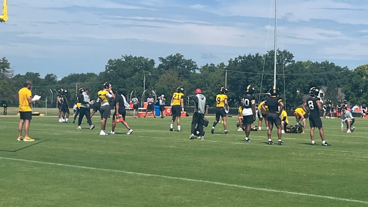 Aug. 11, 2025; Columbia, Missouri, USA; Missouri Tigers quarterbacks and wide receivers line up for a drill during fall camp practice. Aug. 11, 2025; Columbia, Missouri, USA; Missouri Tigers quarterbacks and wide receivers line up for a drill during fall camp practice.