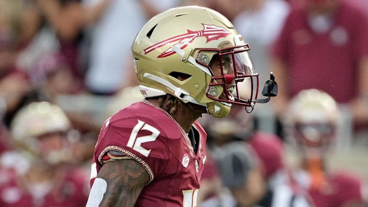 Oct 7, 2023; Tallahassee, Florida, USA; Florida State Seminoles defensive back Conrad Hussey (12) celebrates after a tackle against Virginia Tech Hokies running back Bhayshul Tuten (not pictured) during the second half against the at Doak S. Campbell Stadium. Mandatory Credit: Melina Myers-Imagn Images