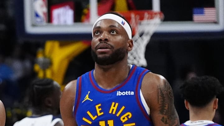 Mar 1, 2026; Denver, Colorado, USA; Denver Nuggets guard Jamal Murray (27) and guard Bruce Brown (11) sub out in the fourth quarter against the Minnesota Timberwolves  at Ball Arena. Mandatory Credit: Ron Chenoy-Imagn Images