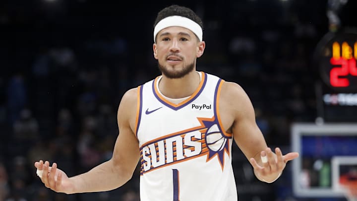 Mar 30, 2026; Memphis, Tennessee, USA; Phoenix Suns guard Devin Booker (1) reacts during the third quarter against the Memphis Grizzlies at FedExForum. Mandatory Credit: Petre Thomas-Imagn Images