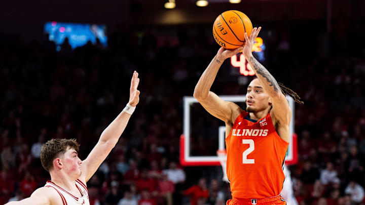 Jan 30, 2025; Lincoln, Nebraska, USA; Illinois Fighting Illini guard Dra Gibbs-Lawhorn (2) shoots a three-point shot against Nebraska Cornhuskers guard Connor Essegian (0) during the second half at Pinnacle Bank Arena. Mandatory Credit: Dylan Widger-Imagn Images