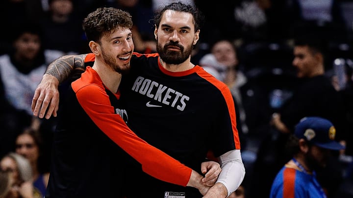 Houston Rockets center Alperen Sengun (28) and center Steven Adams (12) look on in the fourth quarter against the Denver Nuggets at Ball Arena.