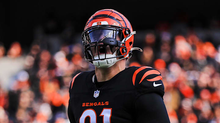 Cincinnati Bengals defensive end Trey Hendrickson runs on the field before a game.