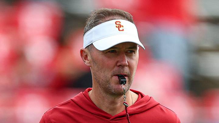 Sep 19, 2026; Piscataway, New Jersey, USA; USC Trojans head coach Lincoln Riley on the field during warm ups before the game against the Rutgers Scarlet Knights at SHI Stadium. Mandatory Credit: Vincent Carchietta-Imagn Images Sep 19, 2026; Piscataway, New Jersey, USA; USC Trojans head coach Lincoln Riley on the field during warm ups before the game against the Rutgers Scarlet Knights at SHI Stadium. Mandatory Credit: Vincent Carchietta-Imagn Images