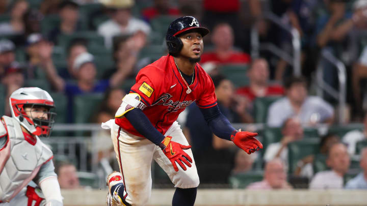 Atlanta Braves second baseman Ozzie Albies hits a home run against the Philadelphia Phillies 