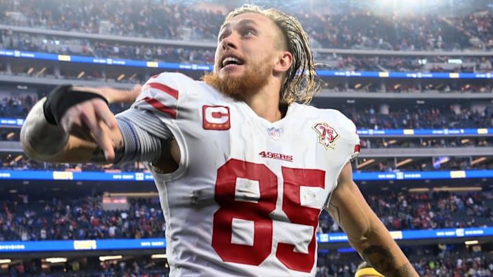 Jan 9, 2022; Inglewood, California, USA;  San Francisco 49ers tight end George Kittle (85) celebrates as he leaves the field after defeating the Los Angeles Rams in the overtime period of the game at SoFi Stadium. Mandatory Credit: Jayne Kamin-Oncea-Imagn Images