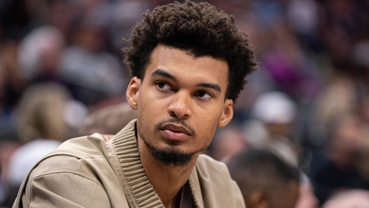 Mar 7, 2025; Sacramento, California, USA; San Antonio Spurs center Victor Wembanyama (1) looks on from the bench during the fourth quarter of the game against the Sacramento Kings at Golden 1 Center. Mandatory Credit: Ed Szczepanski-Imagn Images